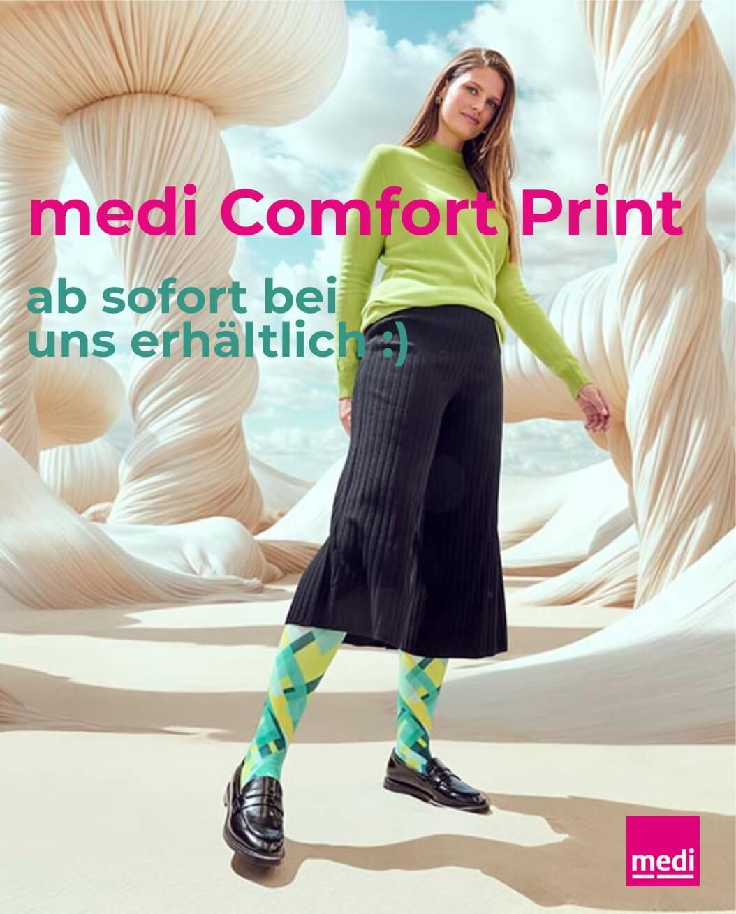 Kind macht Kopfstand auf einer Wiese